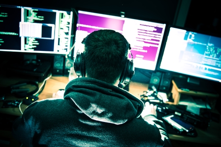 New Hacking Tactics . Pro Hacker In Front of His Computer.の写真素材