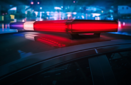 Police Car Flashing Roof Lights at Night 3D Render Illustration.