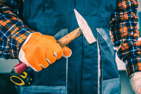 Worker with Hammer Closeup Photo.の写真素材