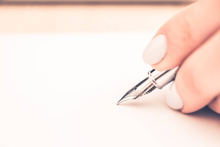 Fountain Pen Writing on the Paper Closeup Photo.の写真素材