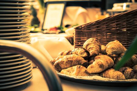 Fresh Italian Croissants Dessert on the Restaurant Open Table.の写真素材