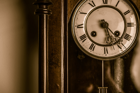 Old antique wooden wall clock.の写真素材