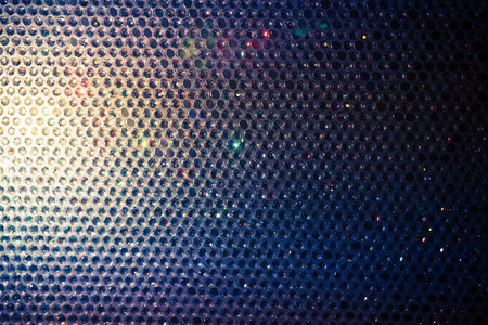 Wall of Diamonds Reflecting Colorful Lights Background Concept.