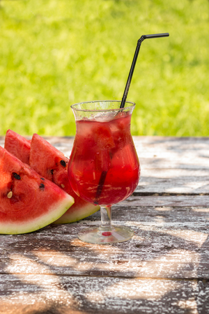 Watermelon juice with sliced fruitの写真素材