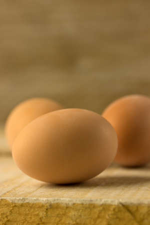 eggs on wooden surfaceの写真素材