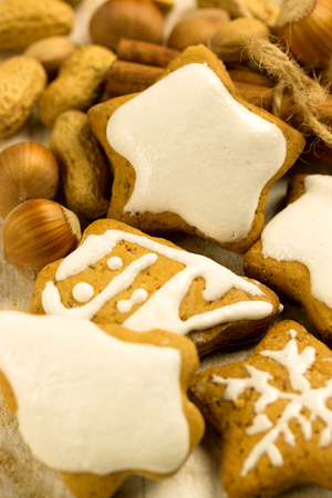 honey cookies in various shape with assorted nutsの写真素材