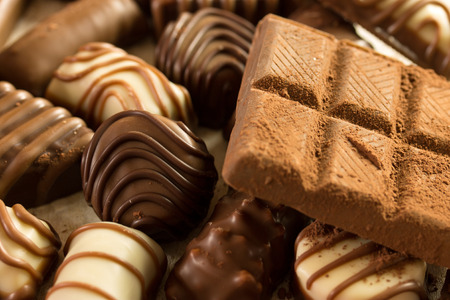 selection of chocolated sweet pralines close upの写真素材