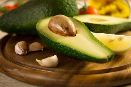 Sliced avocado on a cutting boardの写真素材