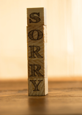 wooden cubes with the text ''sorry''の写真素材