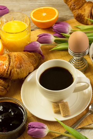 Breakfast with orange juice and fresh croissantsの写真素材