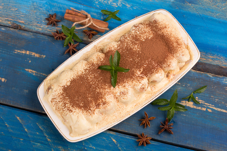 top view of tiramisu dessert decorated with anise,cinnamon and mintの写真素材