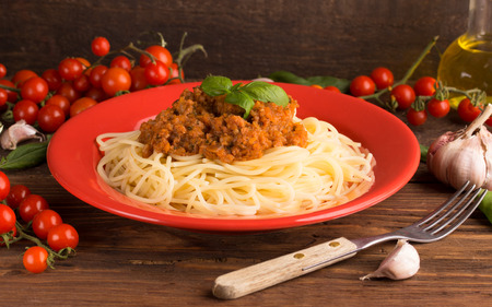 spaghetti bologneze with food ingredientsの写真素材