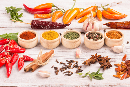 different spices on a wooden tableの写真素材