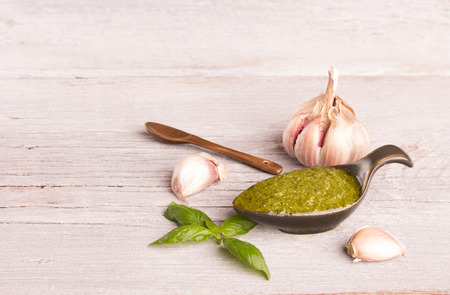 Pesto Genovese in bowl ,garlic  and basilの写真素材