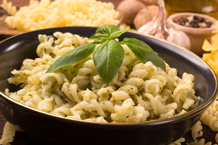 close-up of italian fusilli pasta with homemade pesto sauceの写真素材
