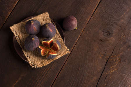 fresh figs in rustic style with free space for your textの写真素材