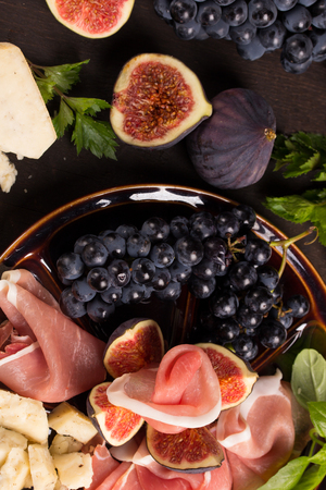 Appetizer of figs and prosciuttoの写真素材