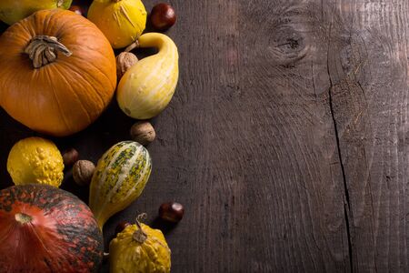 pumpkins over wooden backgroundの写真素材