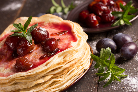 delicious pancakes with homemade fresh plum`s confitureの写真素材