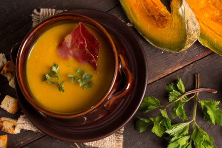 top view of pumpkin soup in a ceramic bowlの写真素材