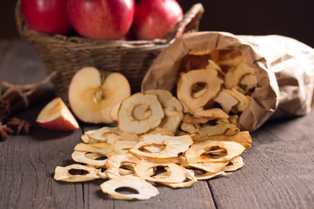 dried apple on dark wooden tableの写真素材