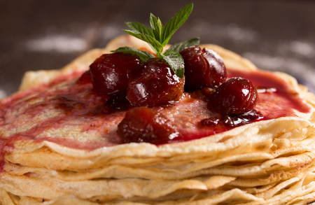 pancakes with  fresh plum`s confitureの写真素材