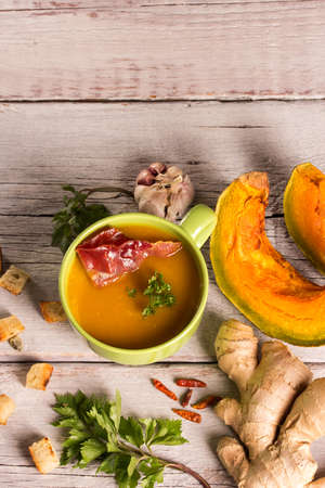 pumpkin soup with green bowlの写真素材