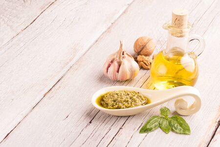 pesto sauce on wooden tableの写真素材