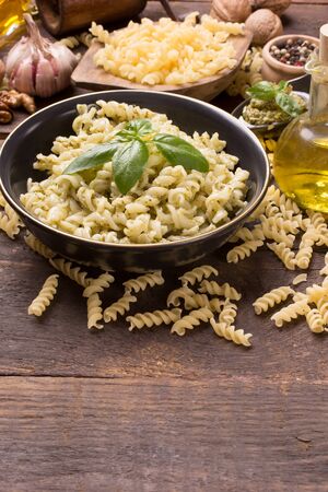 fusilli with green pesto sauceの写真素材