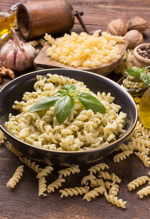 fusilli with green basil pesto sauceの写真素材