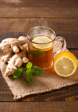hot ginger tea with lemon and mintの写真素材