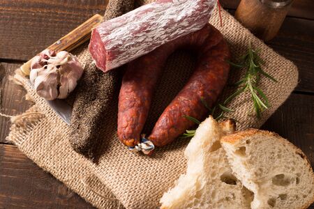 various sausages on a canvas in rustic styleの写真素材