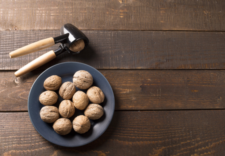 top view of walnuts on a blue plateの写真素材