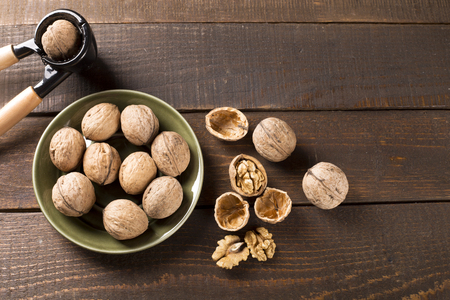 top view of walnuts with nutcrackerの写真素材