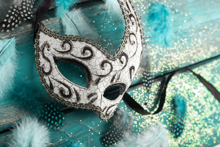 female carnival mask with glittering backgroundの写真素材