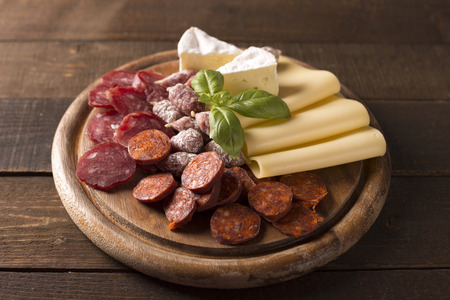 closeup of appetizer on cutting boardの写真素材