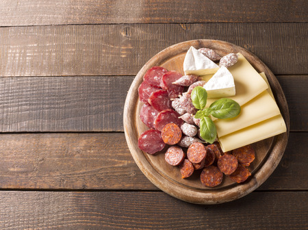 top view of appetizer with sausages and cheeseの写真素材