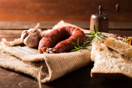 chorizo sausage in rustic styleの写真素材