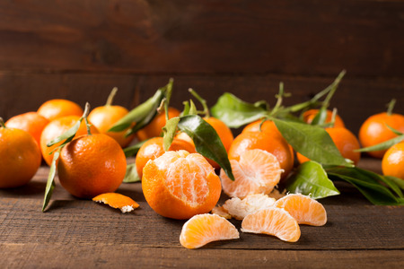 tangerine clementine on the wooden tableの写真素材