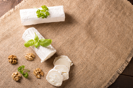 Fresh goat cheese in rustic styleの写真素材