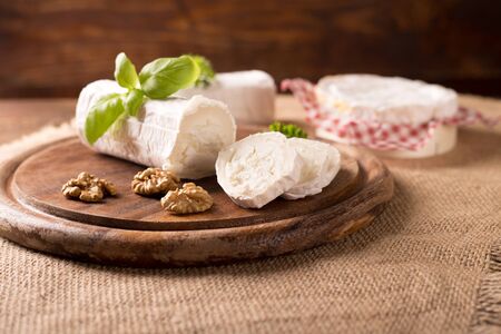 Fresh goat cheese in rustic styleの写真素材