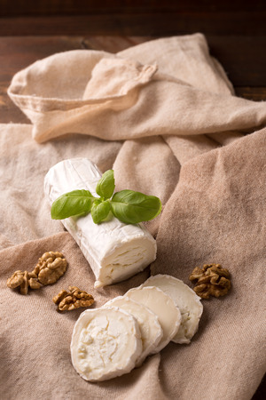 Fresh goat cheese in rustic styleの写真素材