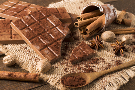 Chocolate in  vintage style. Delicious chocolate with cinnamon and cocoaの写真素材