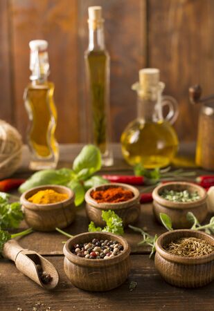 Powder spices on  wooden table backgroundの写真素材