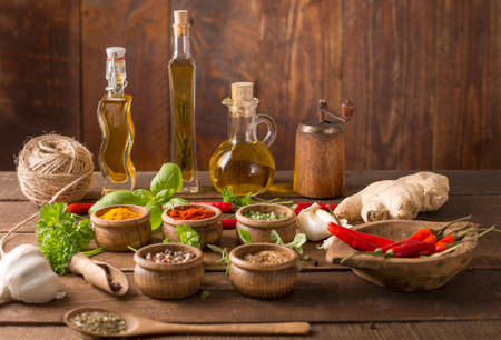 Powder spices on  wooden table backgroundの写真素材