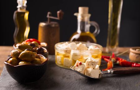 Feta Cheese and Olives on wooden backgroundの写真素材