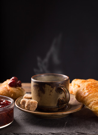 hot coffee with croissant for breakfastの写真素材