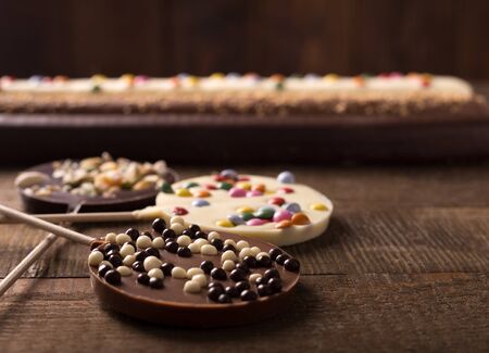sweets on a wooden table for children's dayの写真素材
