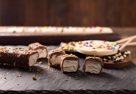 sweets on a wooden table for children's dayの写真素材