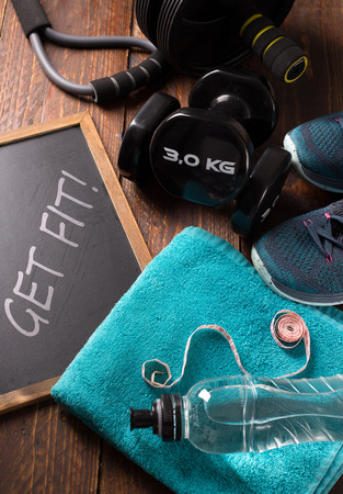 fitness concept with dumbell and bottle of  waterの写真素材